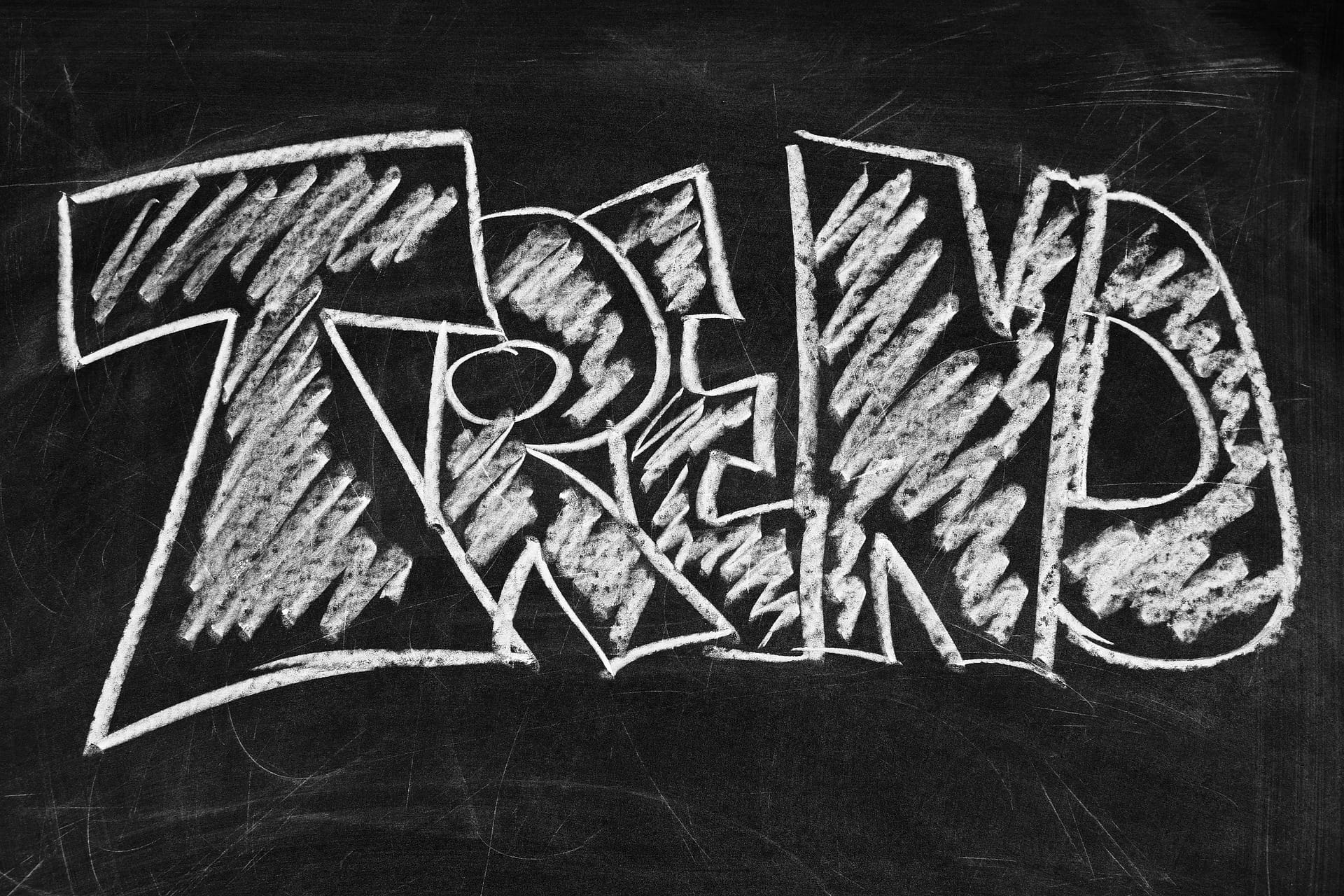 The word 'trend' written on a chalkboard as PVC spray paint is a trend