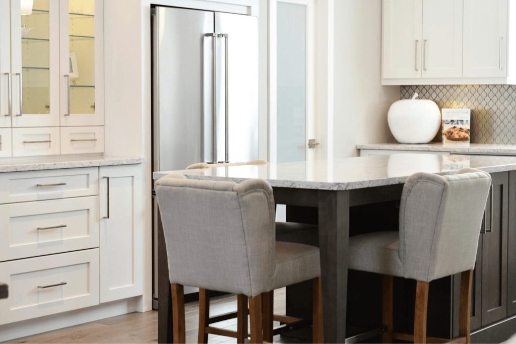 A photo of kitchen cabinets in the UK that have had a spray